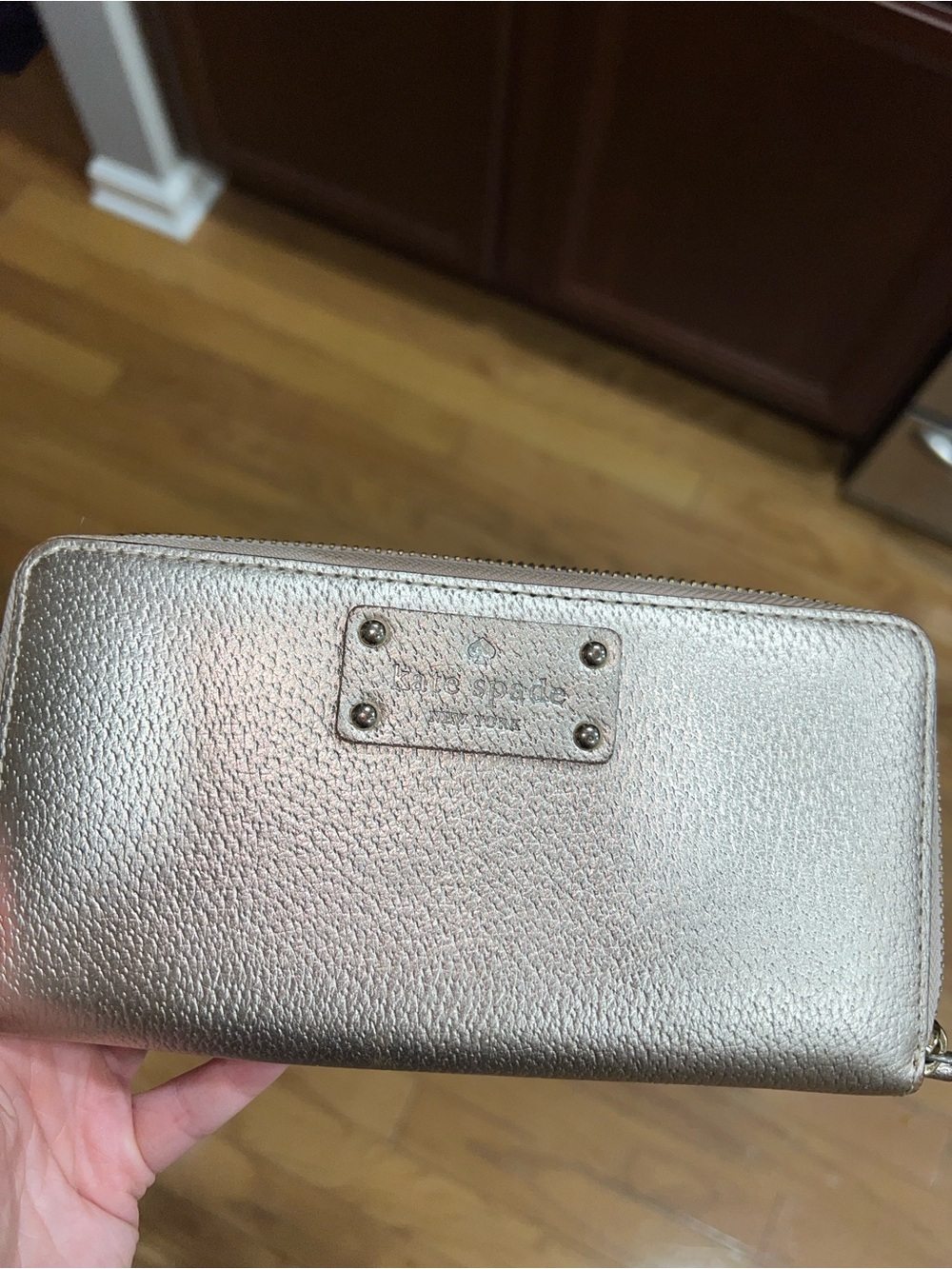 kate spade metallic gold zip-around wallet